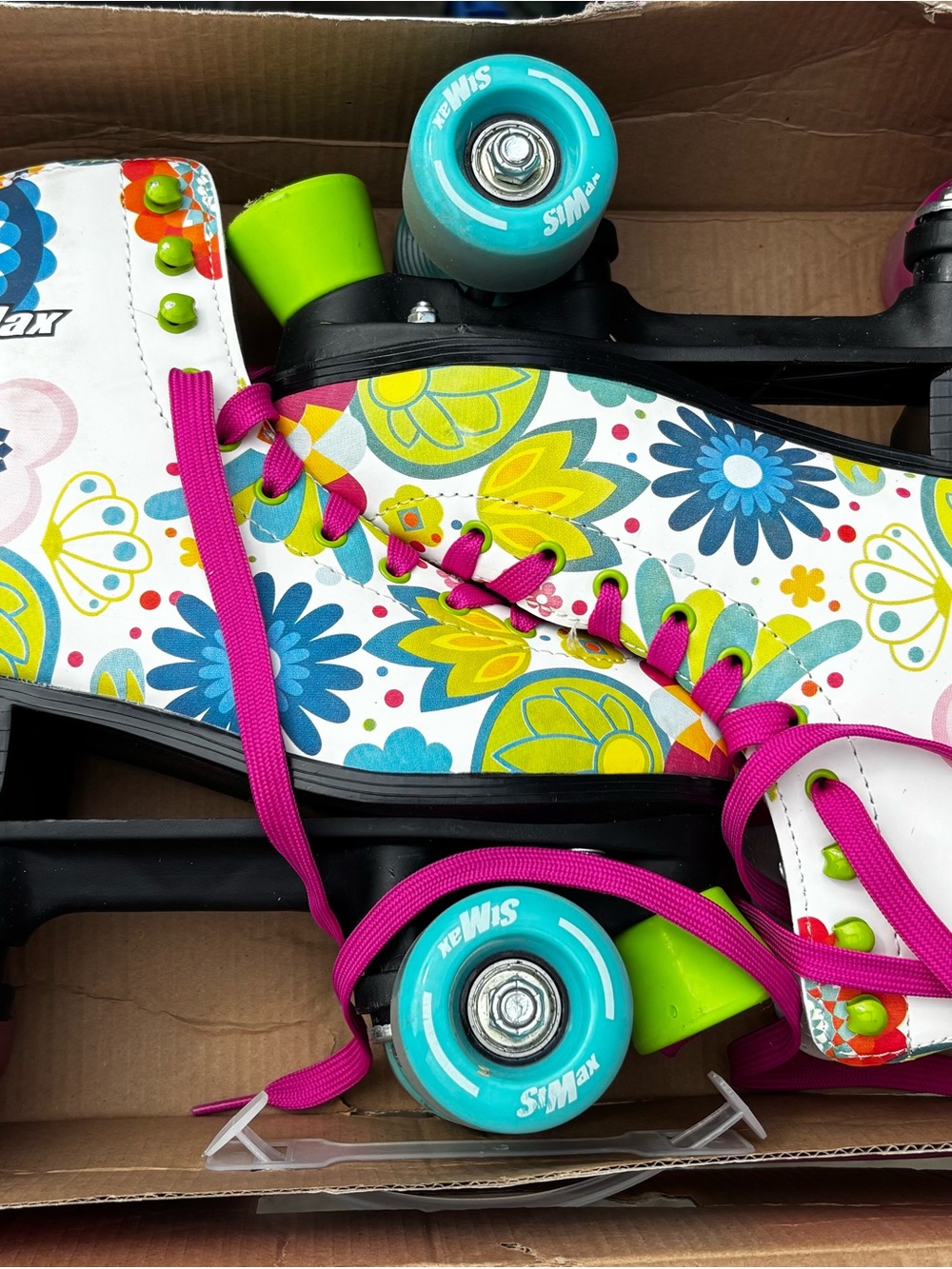 Kids Floral Quad Roller Skates with Bright Pink Laces